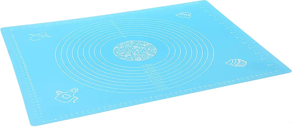 Silicone dough mat with measurements for spreading multi-colored pizza