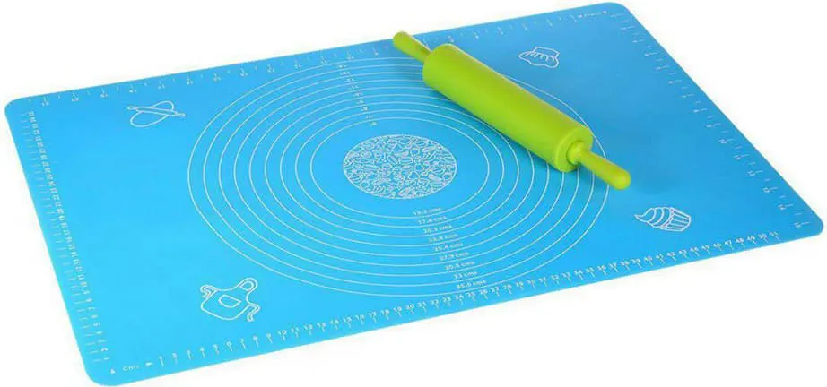 Silicone dough mat with measurements for spreading multi-colored pizza
