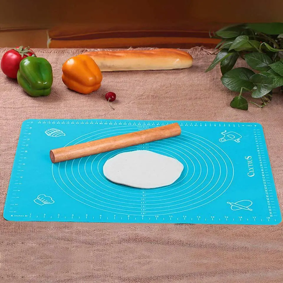 Silicone dough mat with measurements for spreading multi-colored pizza