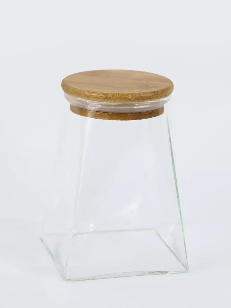 Glass jar with wood lid, sealed with hexagonal shape