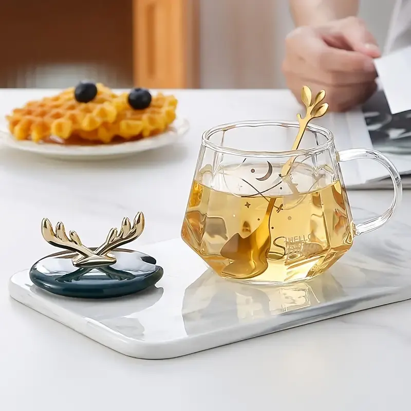 Clear glass mug with spoon and gazelle-shaped lid, 400 ml