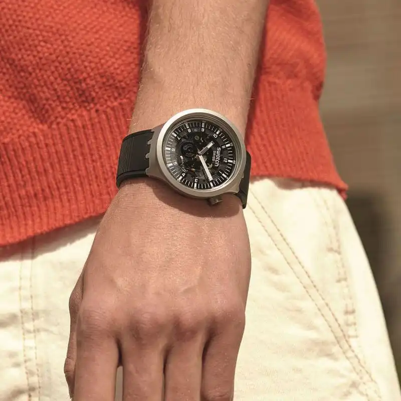 Swatch Unisex 's Round Shape Resin Strap Analog Wrist Watch, Black , SB07S105