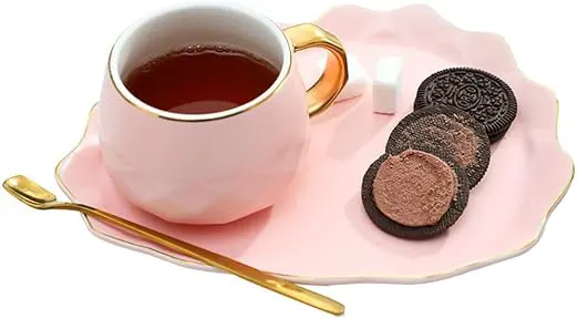 Nescafe and coffee mug from Oxford with a heart-shaped spoon - pink gold