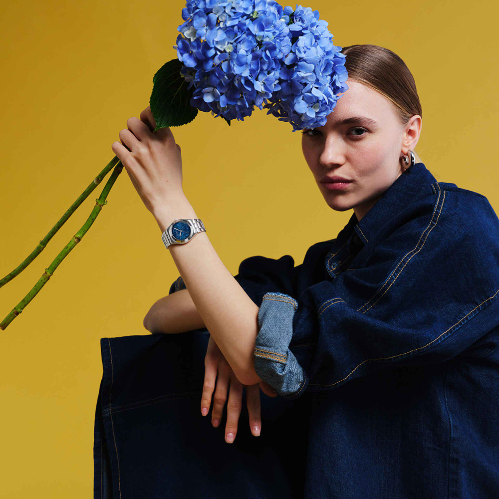 Swatch Women's Watch, Polished Blue Dial, Round Hands, Silver Stainless Steel Band, Analog Wrist Watch, Silver, YLS235G