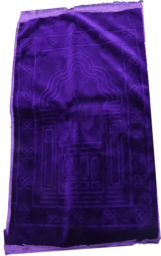 A Patterned Velvet Prayer Mat, In Various Colors.